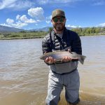 Colorado fly fishing - man with a trout